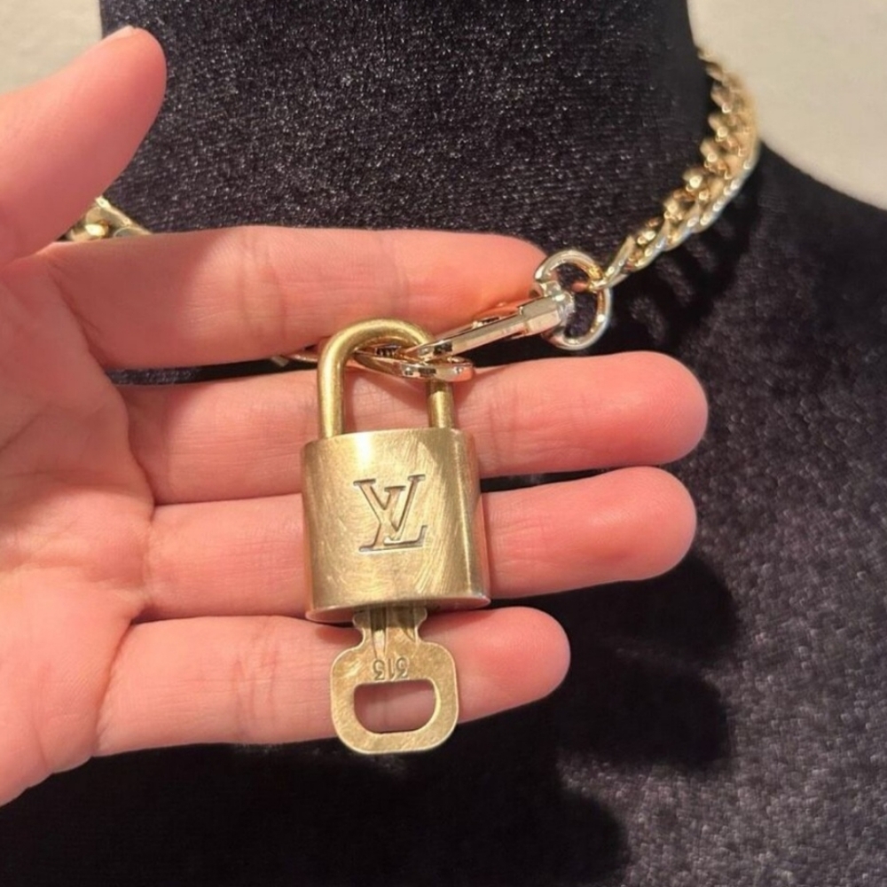 Louis Vuitton lock with chain